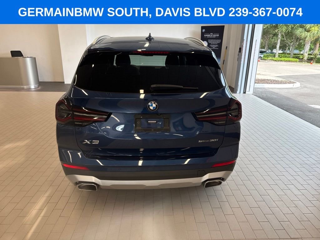 Certified Used 2022 Blue Metallic BMW sDrive30i image 4