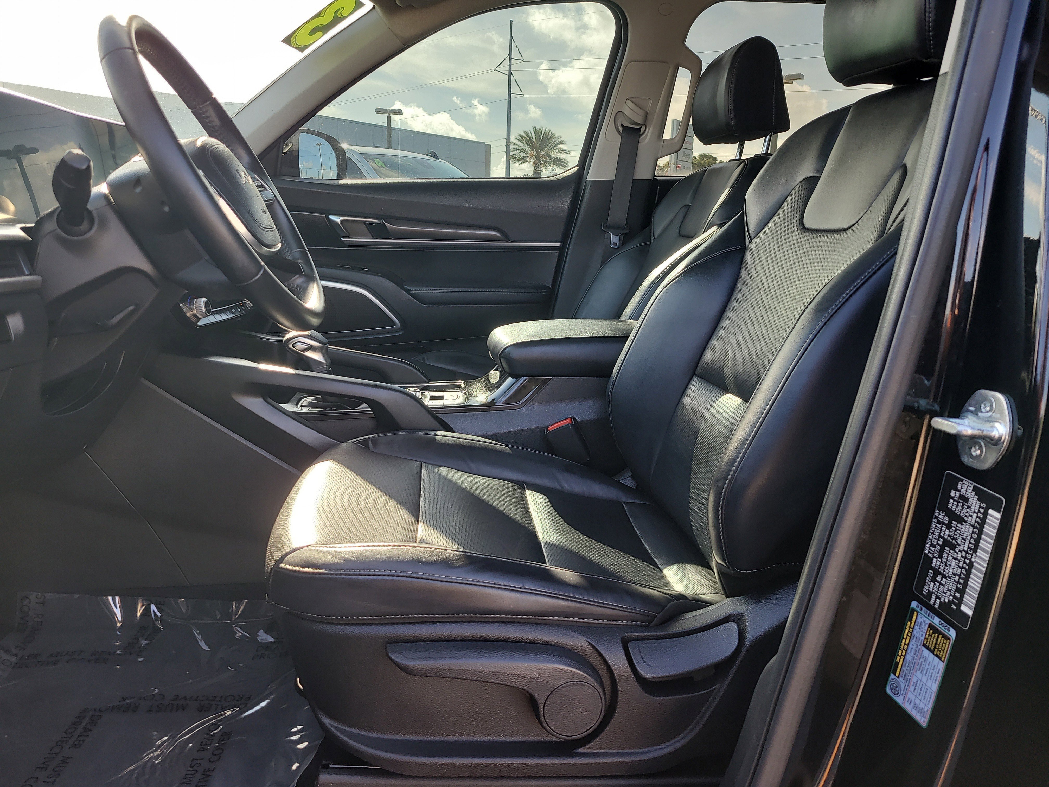 Used 2023 Ebony Black Kia LX image 18