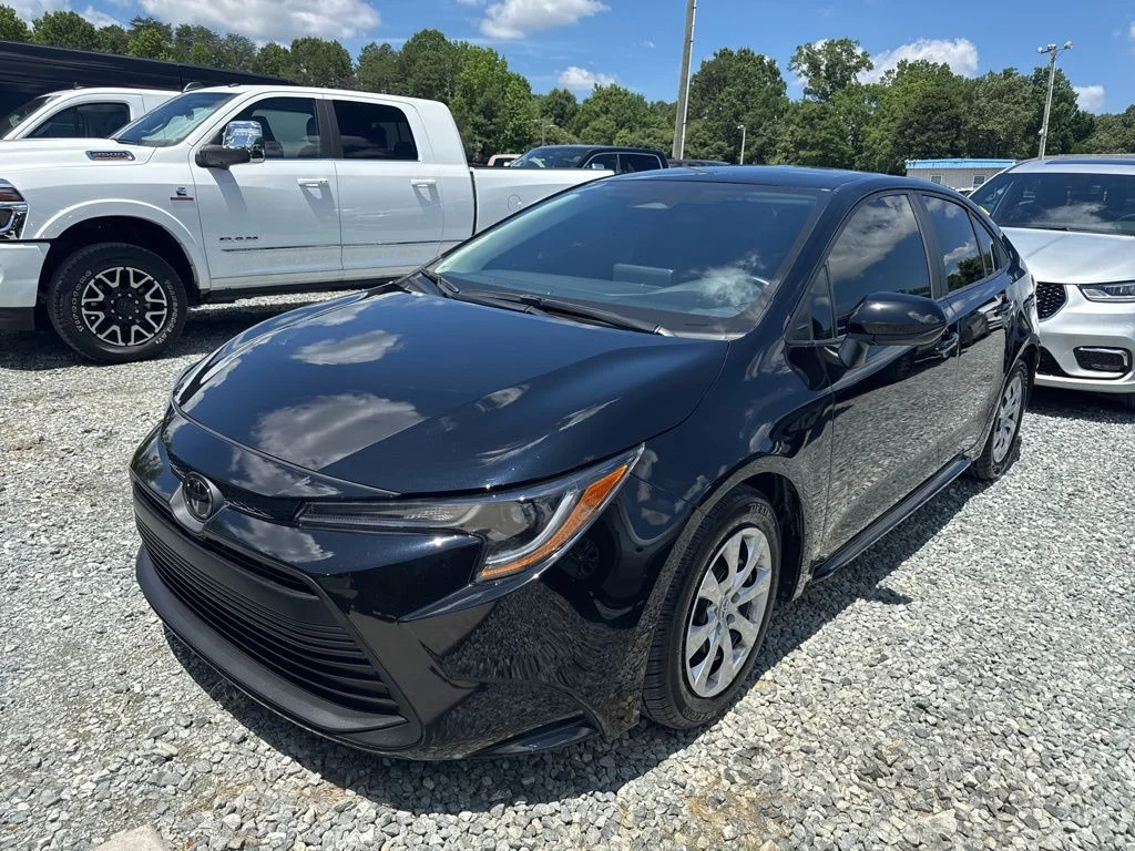 Used 2024 Black Toyota LE image 1