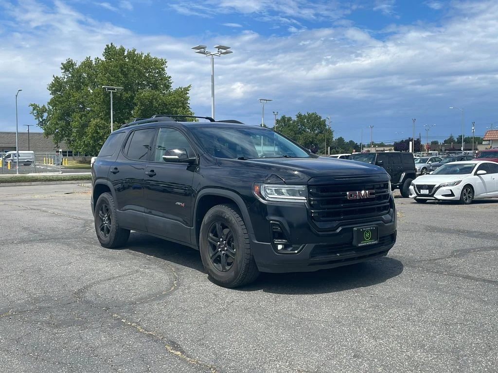 Used 2021 Ebony Twilight Metallic GMC AT4 image 1