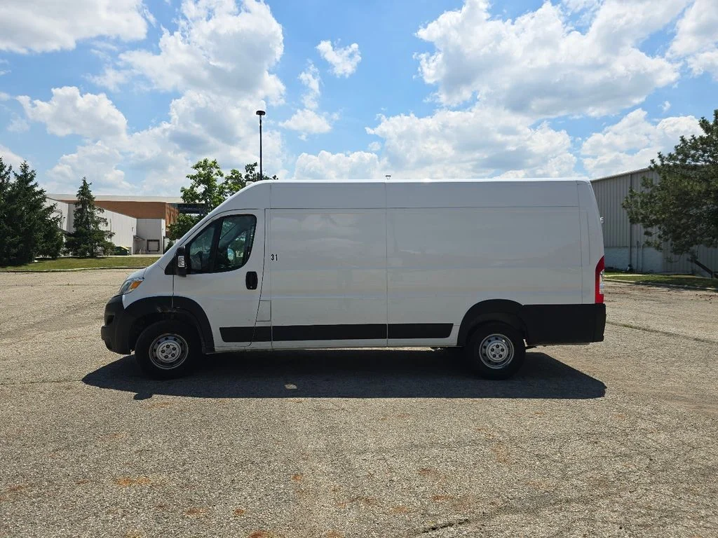Used 2023 Bright White Clearcoat Ram High Roof image 9