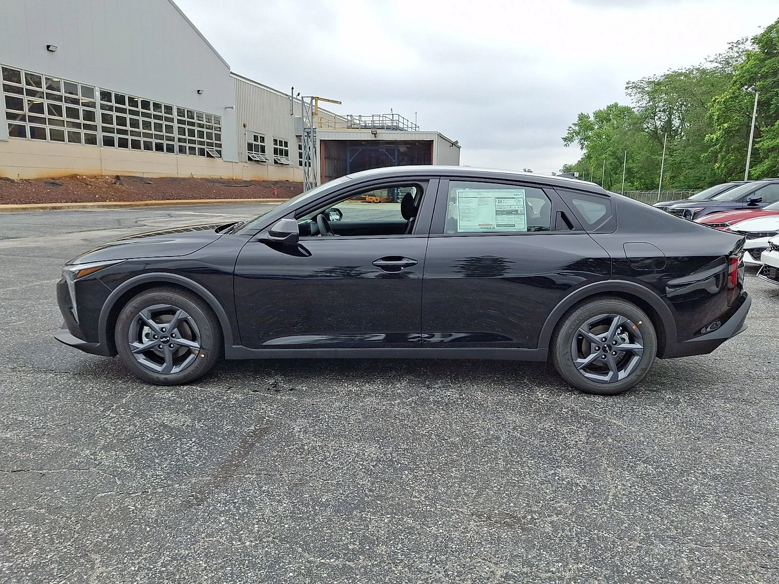 New 2026 Black Kia LXS image 5