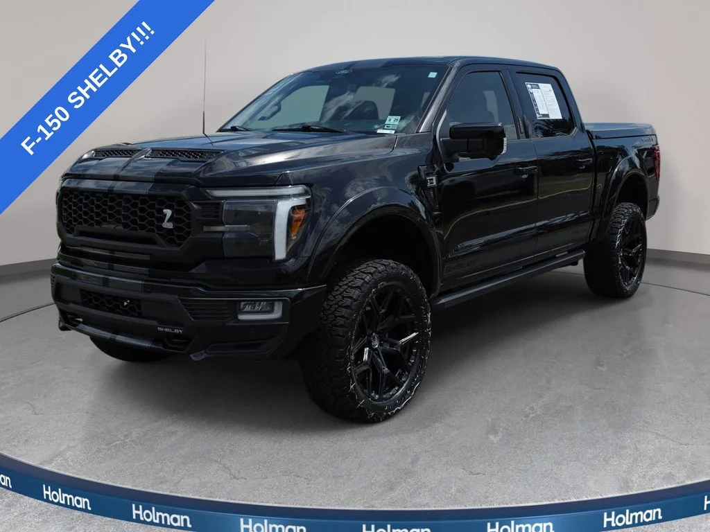 Used 2024 Black Metallic Ford Lariat image 1