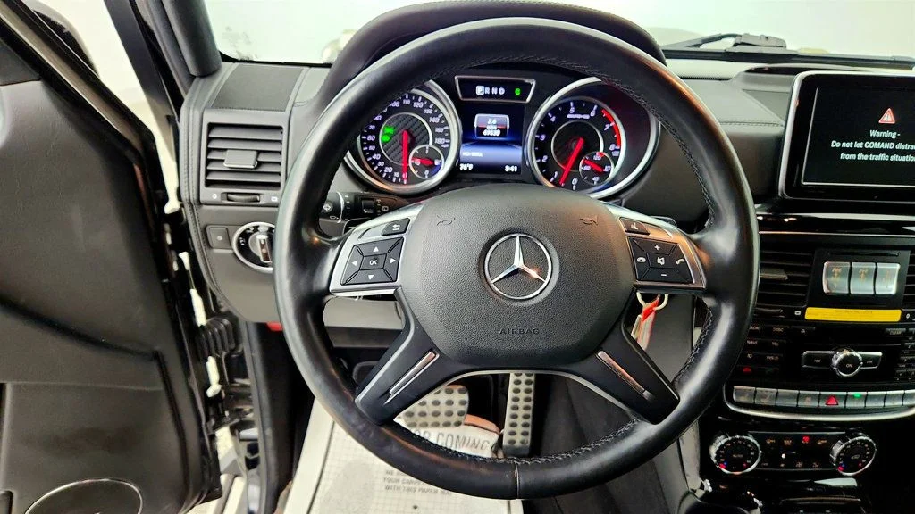 Used 2016 Black Mercedes-Benz 4MATIC 4dr AMG® G 63 w/ designo Exclusive Leather Pkg image 13