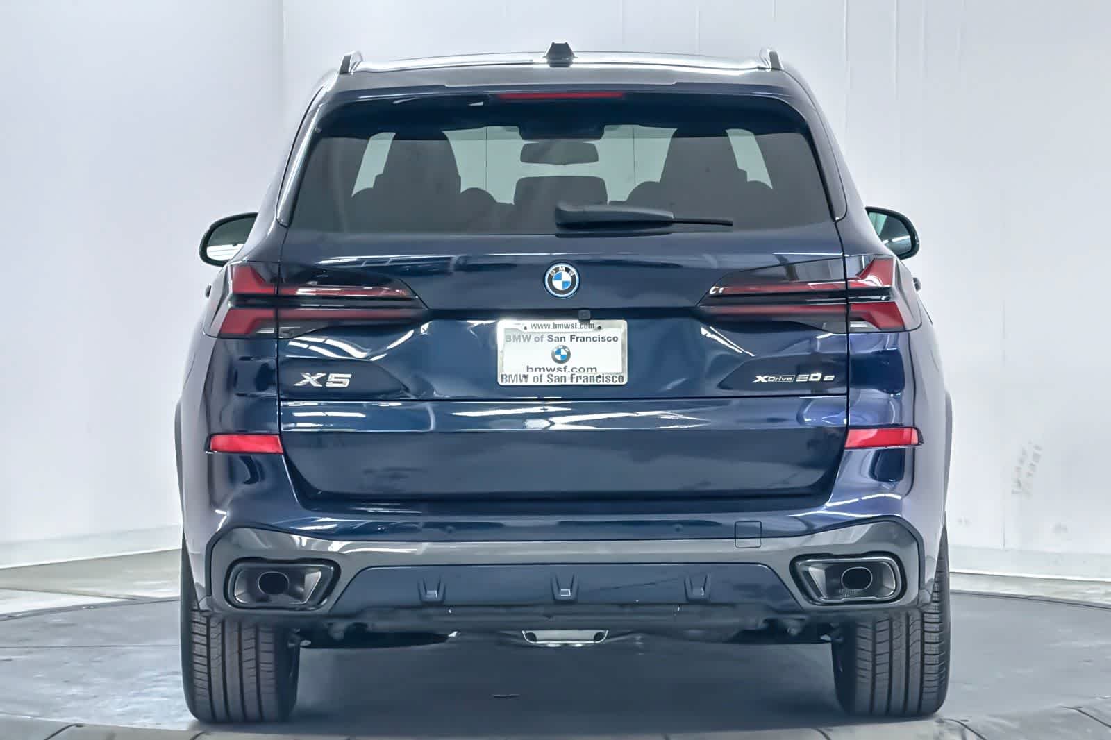 New 2026 Tanzanite Blue II Metallic BMW xDrive50e image 7