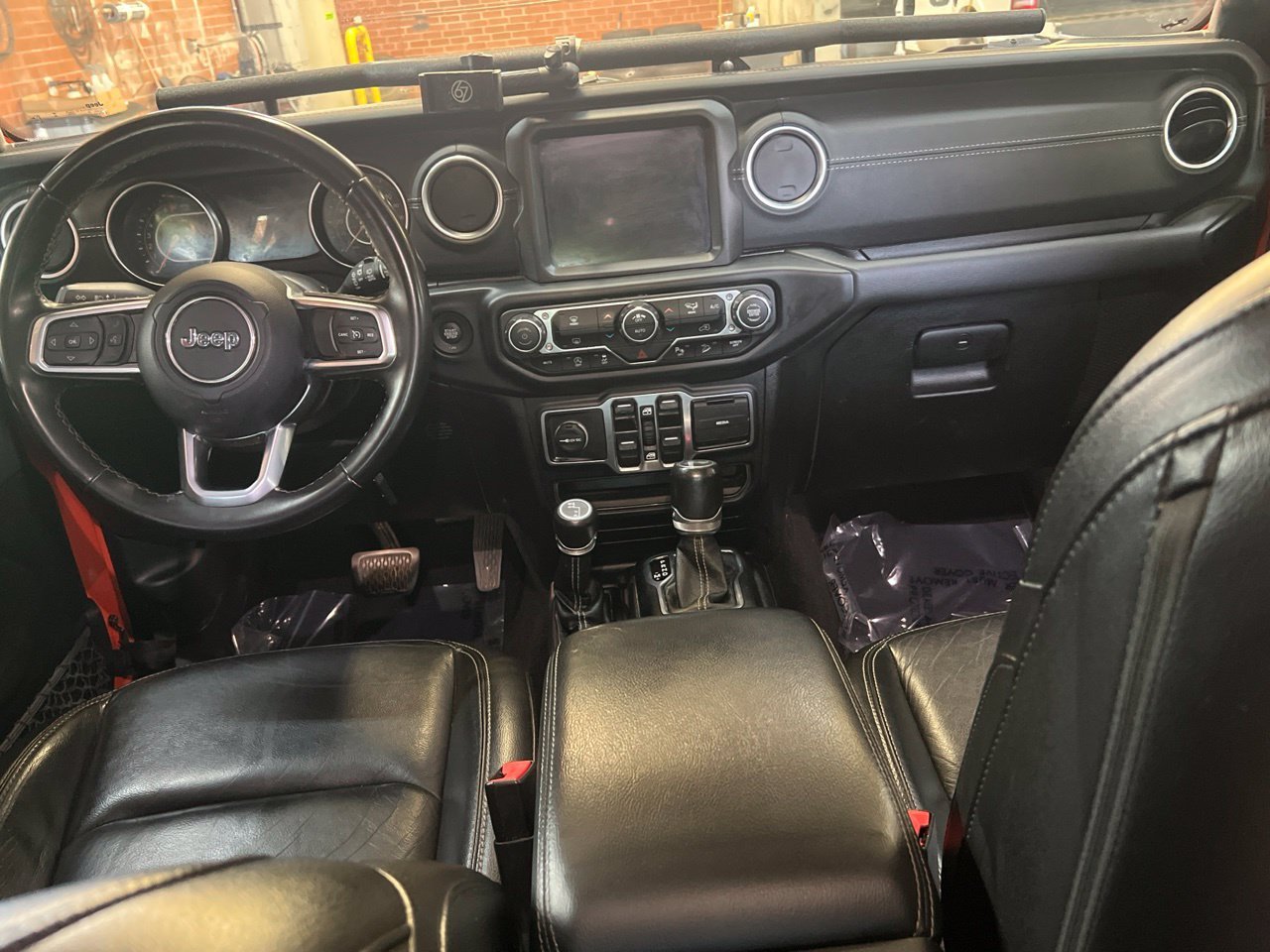 Used 2020 Orange Jeep Unlimited Sahara image 17