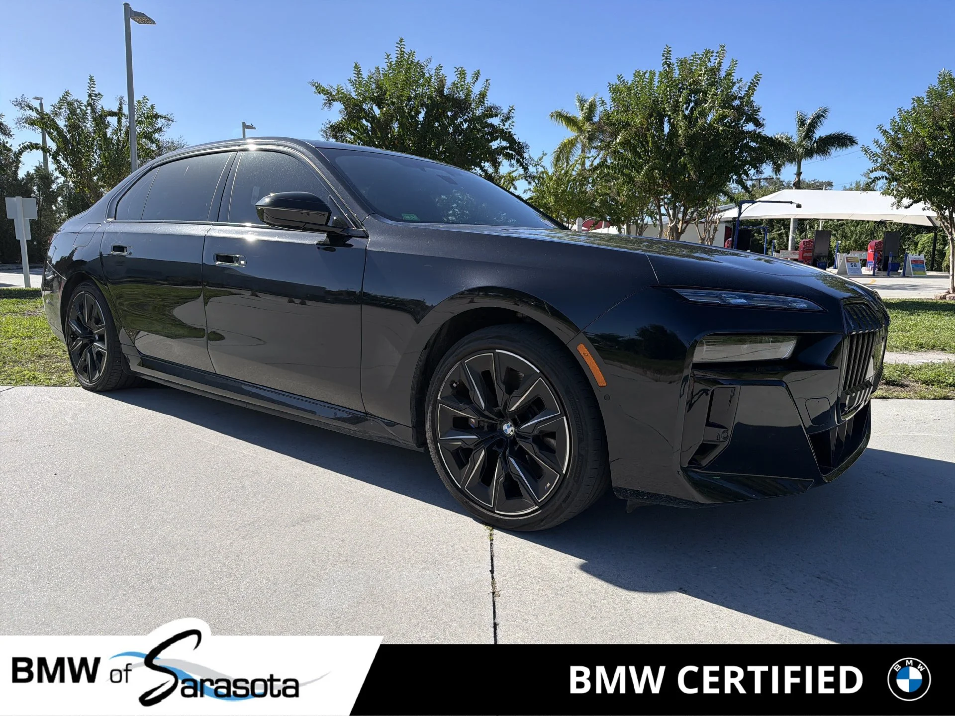 Certified Used 2024 Black Sapphire Metallic BMW xDrive60 image 1