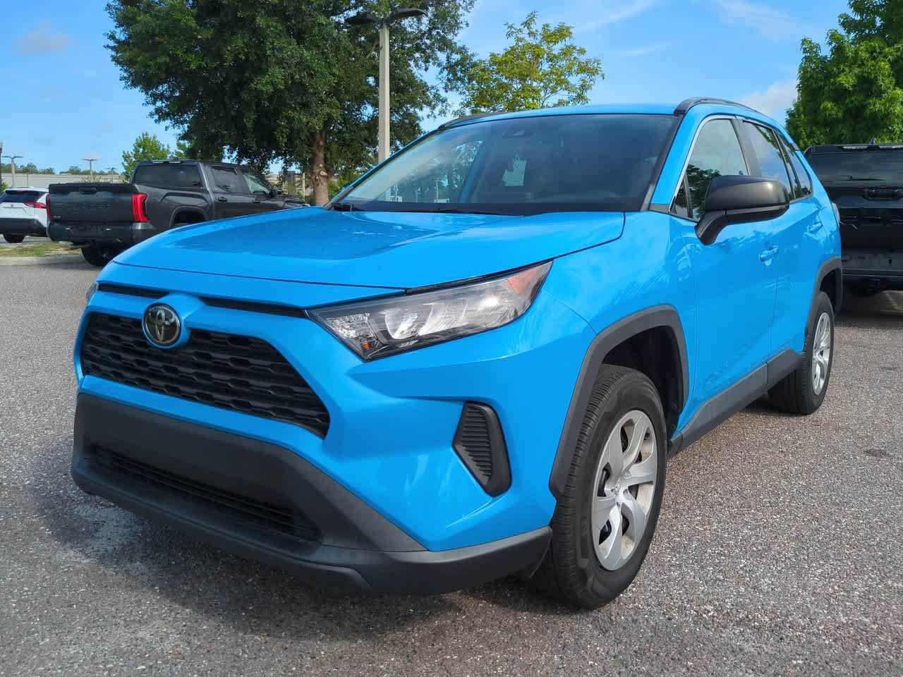 Used 2021 Blue Flame Toyota LE image 2