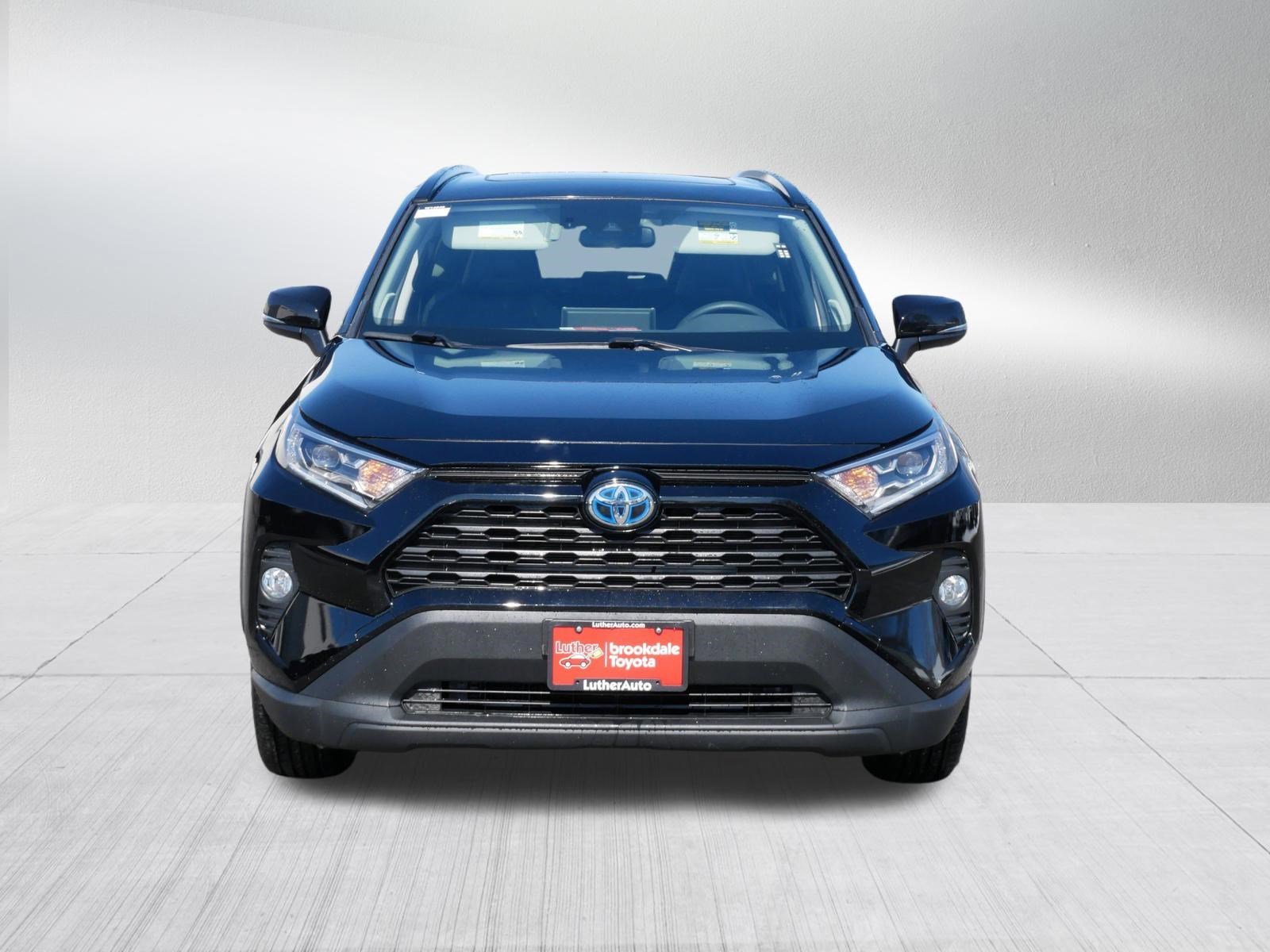 Used 2021 Toyota RAV4 XLE Premium with VIN JTMB6RFV9MD040557 for sale in Brooklyn Center, Minnesota