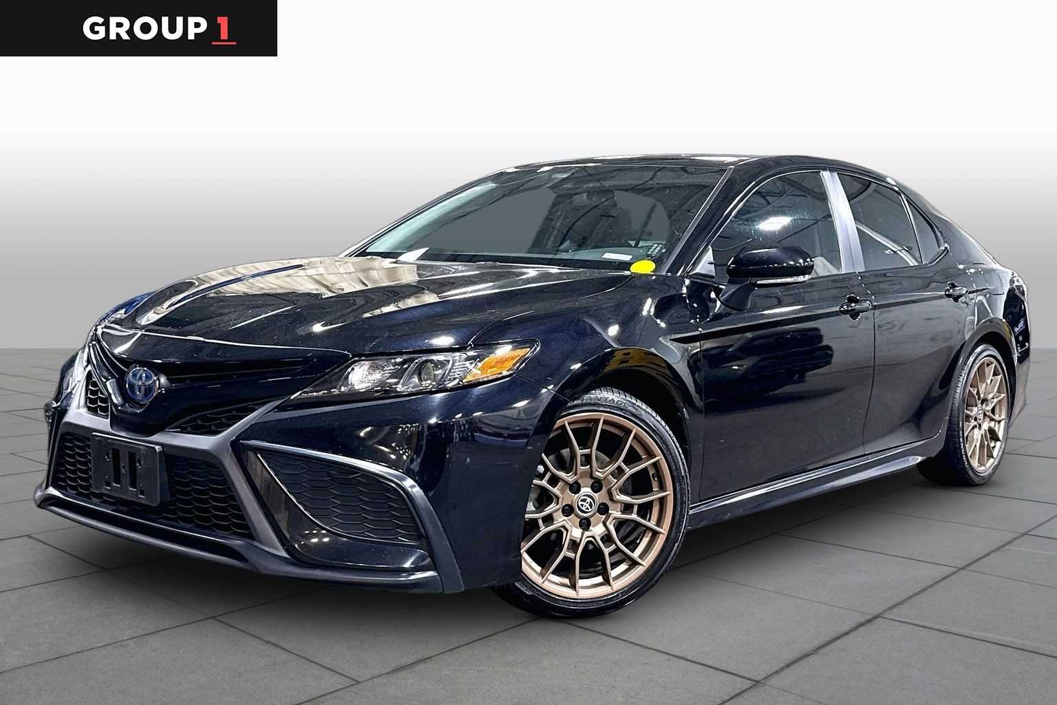 Used 2024 Midnight Black Metallic Toyota Hybrid SE Nightshade image 1