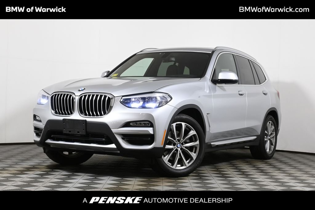 Used 2018 Silver BMW xDrive30i image 1