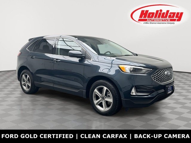 Used 2024 Stone Blue Ford SEL image 1