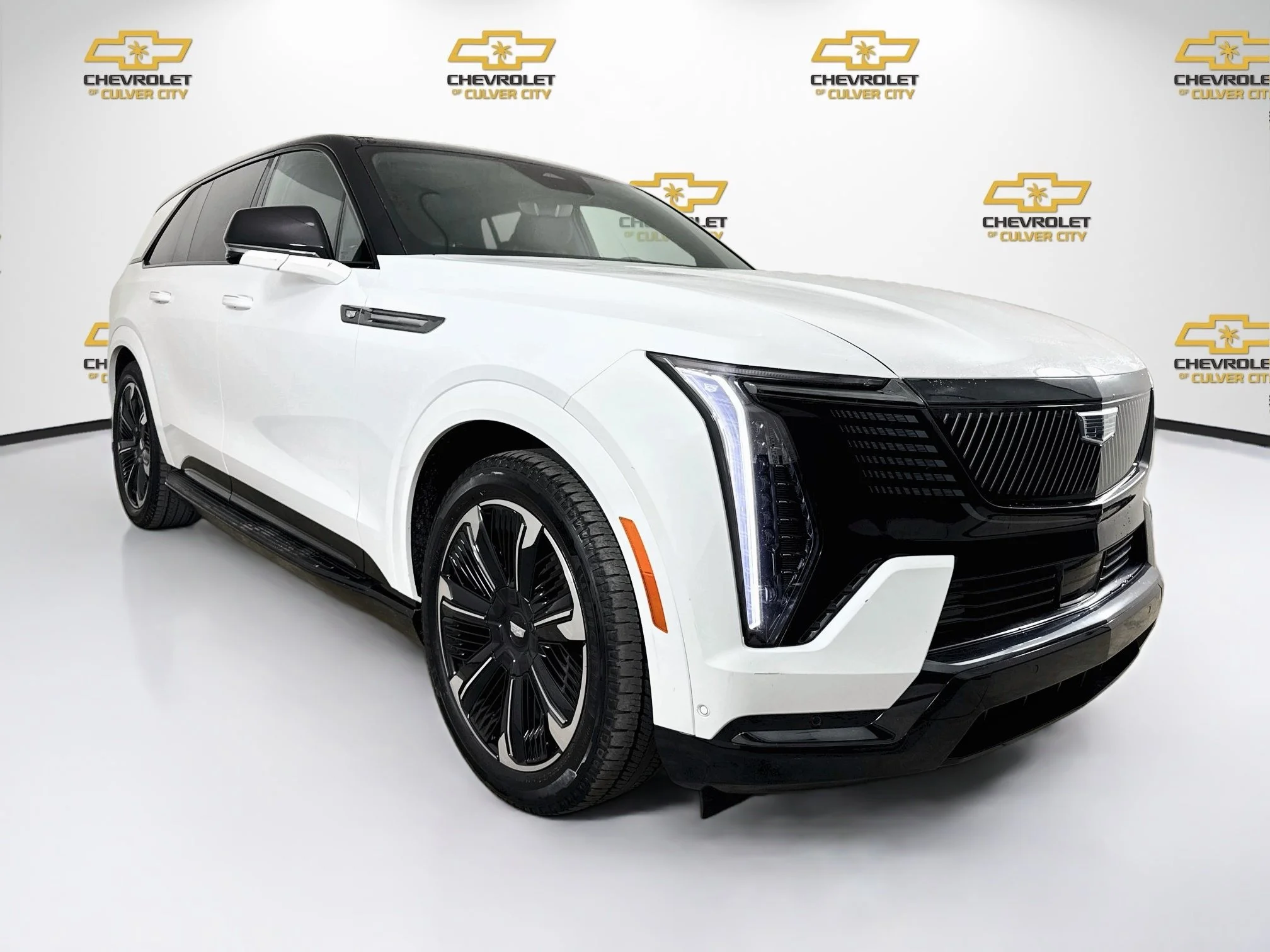 Used 2025 Summit White Cadillac Sport 1 image 1