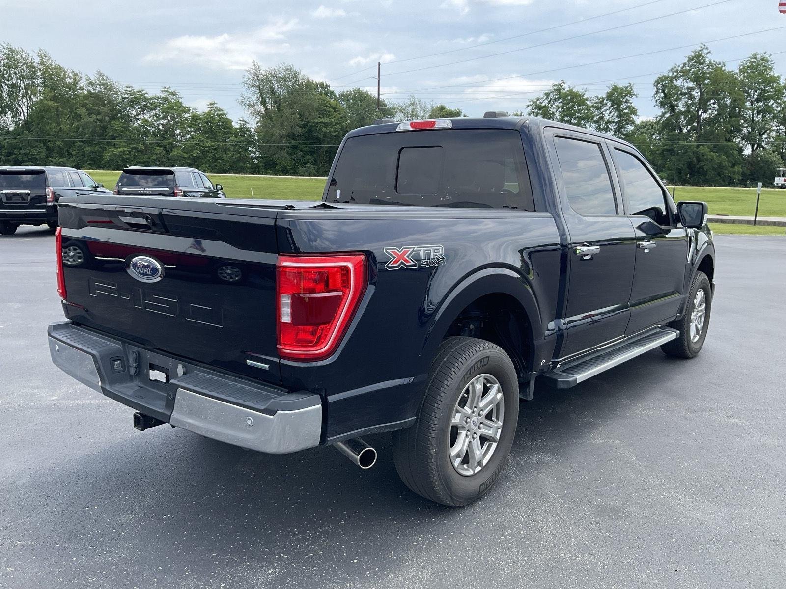 Used 2023 Antimatter Blue FORD XLT 4WD SUPERCREW 5.5