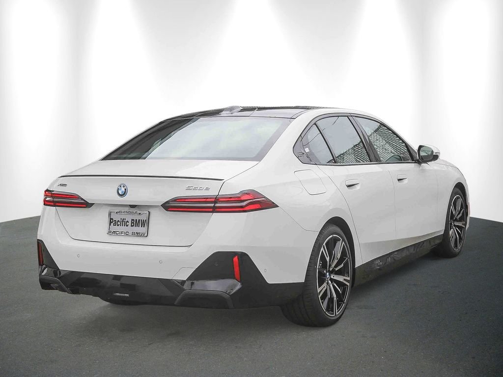 New 2027 Alpine White BMW 550e xDrive image 6