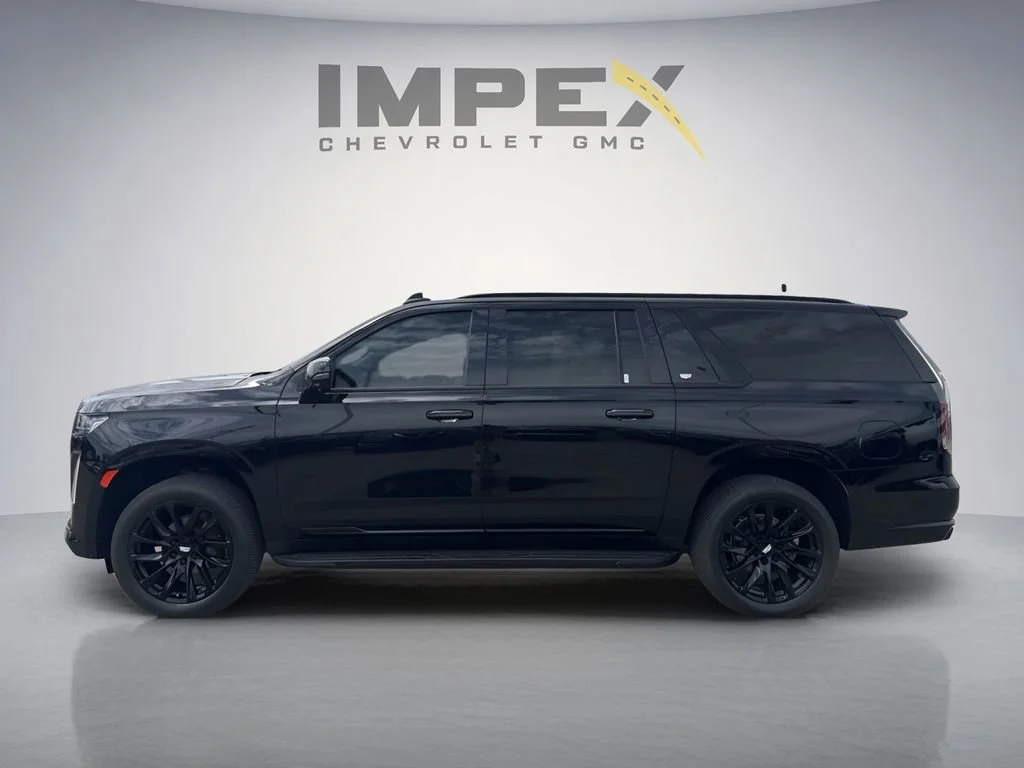 Used 2022 Black Raven Cadillac Sport image 2