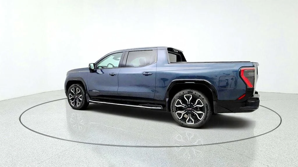 Used 2026 Deep Ocean Metallic GMC e4WD Crew Cab Max Range Denali image 7