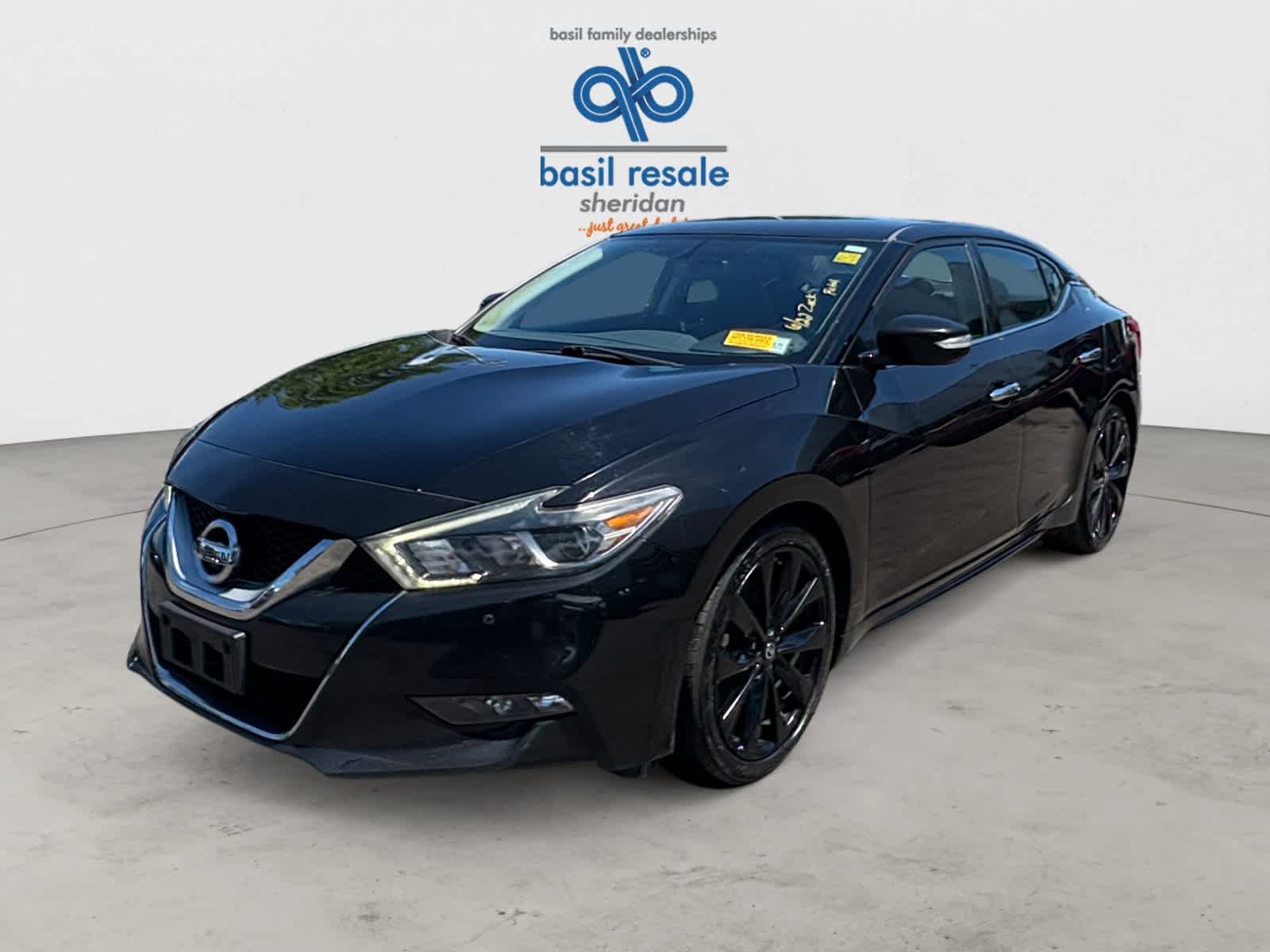 Used 2017 Super Black Nissan SR image 2