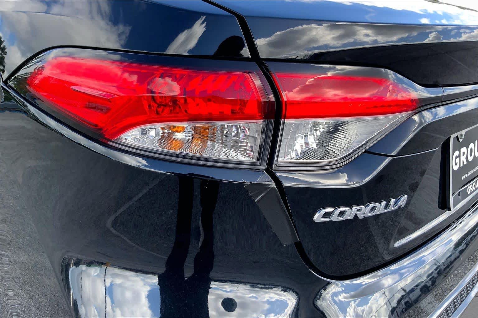 Used 2023 Midnight Black Metallic Toyota LE image 28