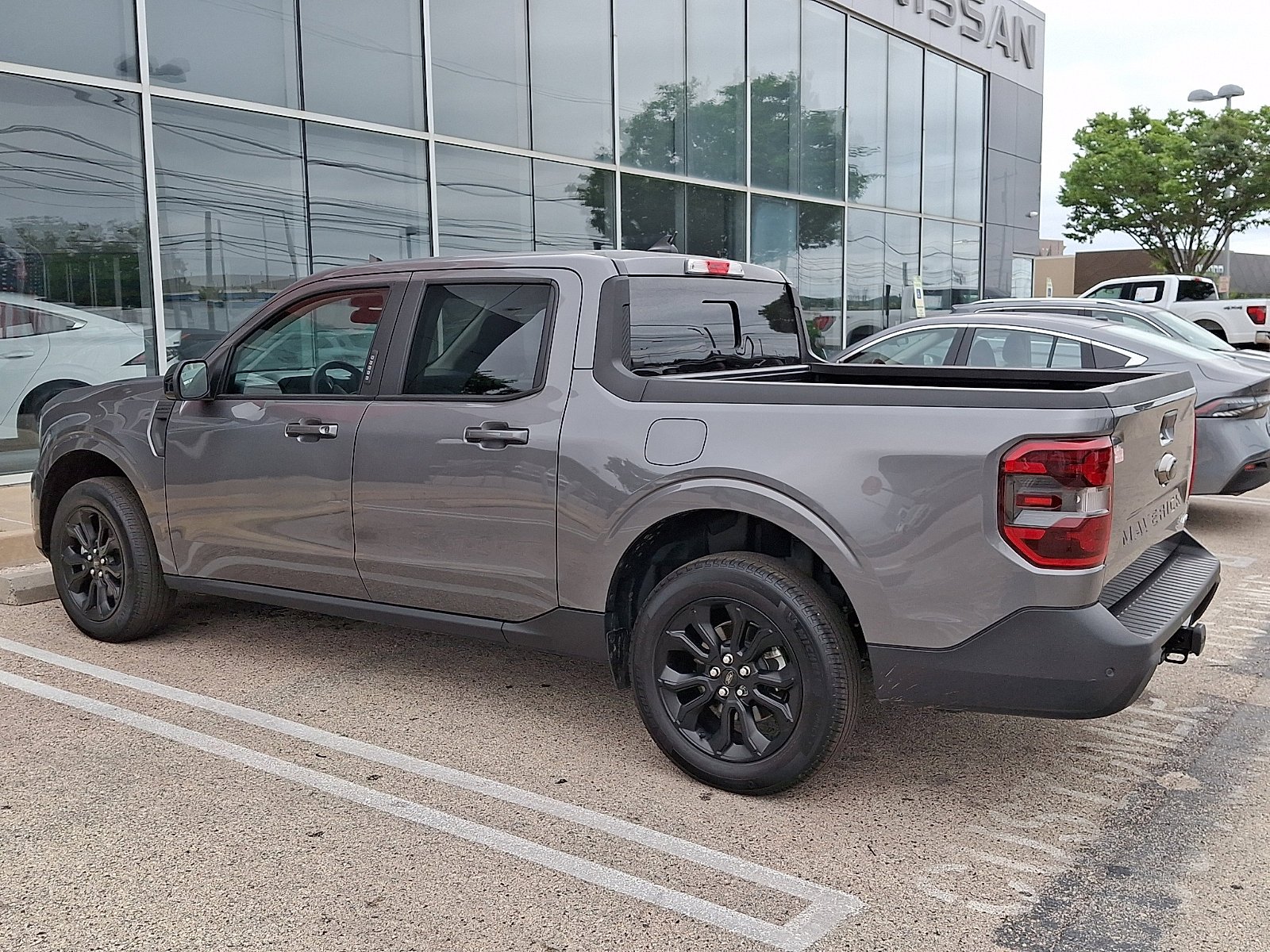 Used 2023 Carbonized Gray Metallic Ford LARIAT image 2