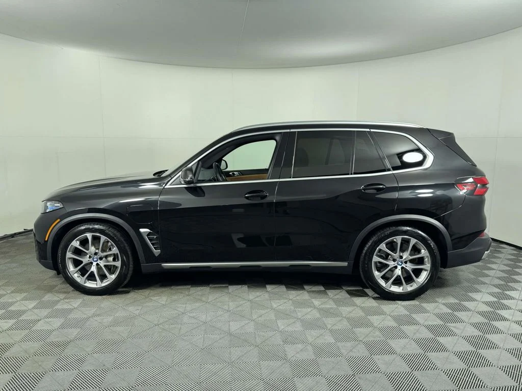 Certified Used 2024 Black BMW xDrive50e image 11
