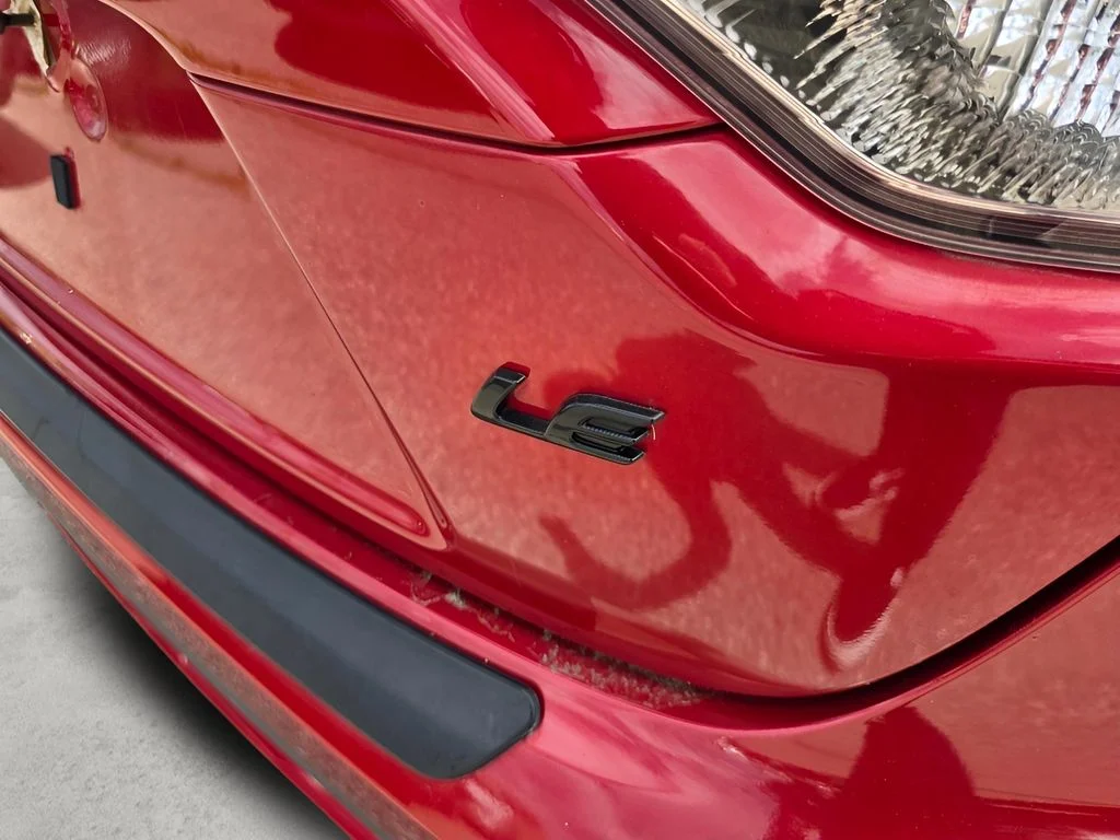Used 2021 Barcelona Red Metallic Toyota LE image 19