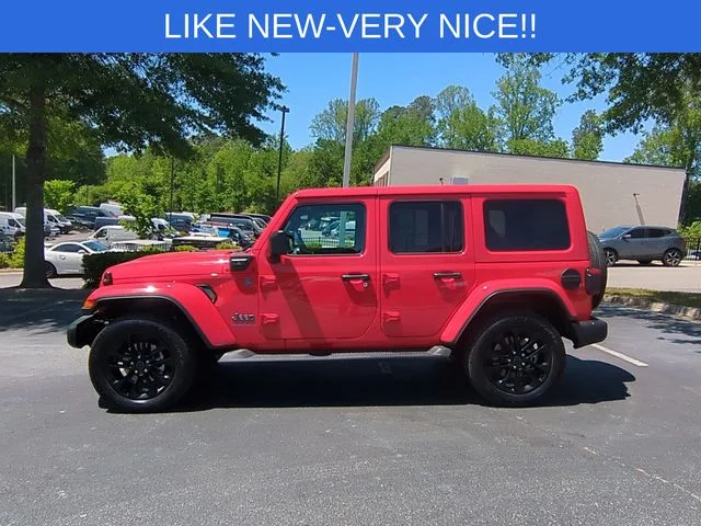 Used 2025 Red Jeep Sahara 4xe image 2