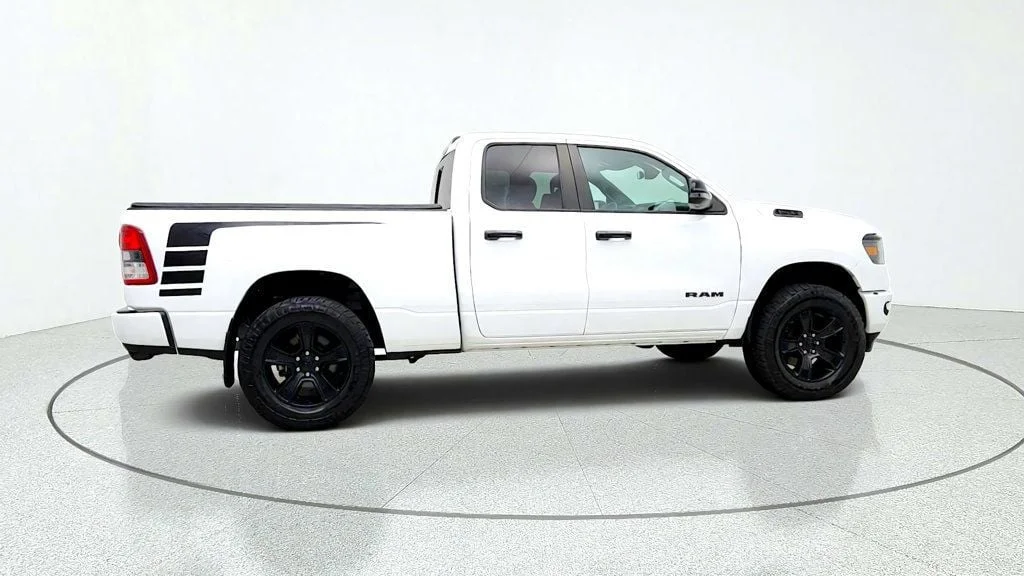 Used 2023 Bright White Clearcoat Ram Big Horn Quad Cab 4x4 Night Edition w/ HEMI V8 & Level 2 Group image 4