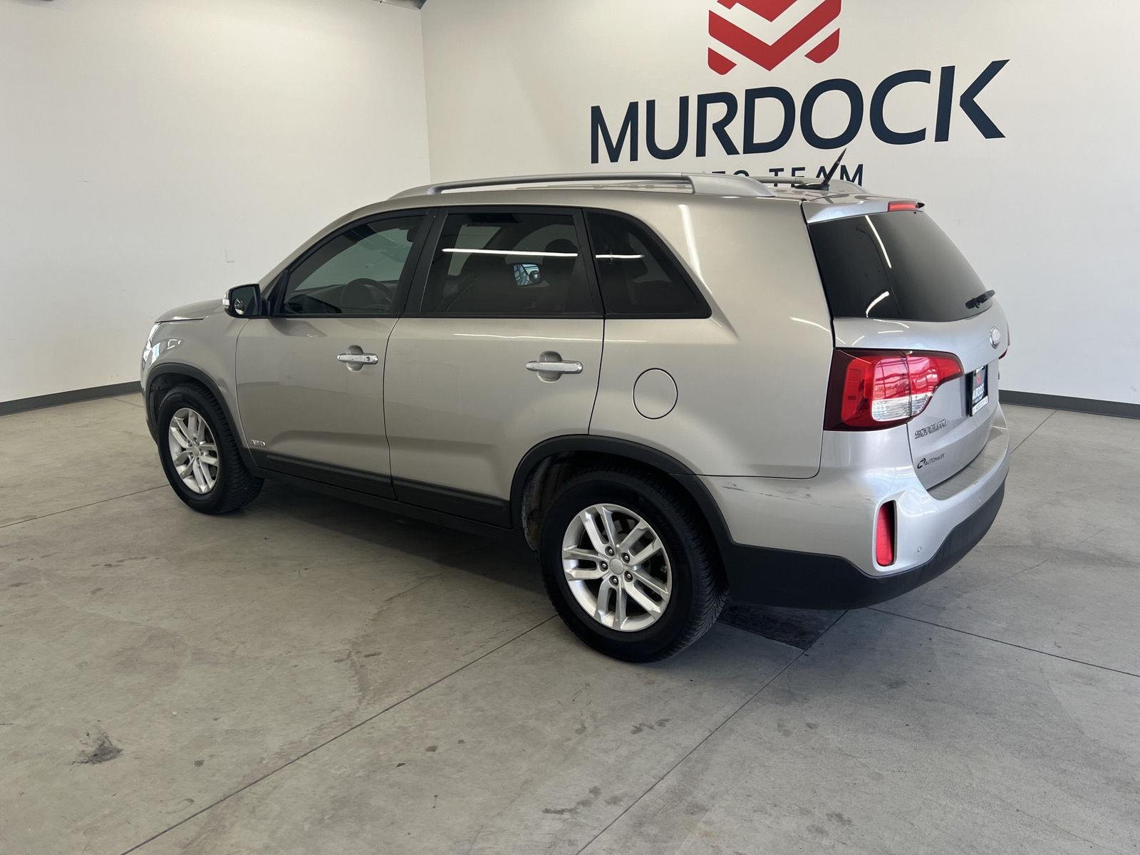 Used 2014 Kia Sorento LX with VIN 5XYKTCA67EG439007 for sale in Logan, UT