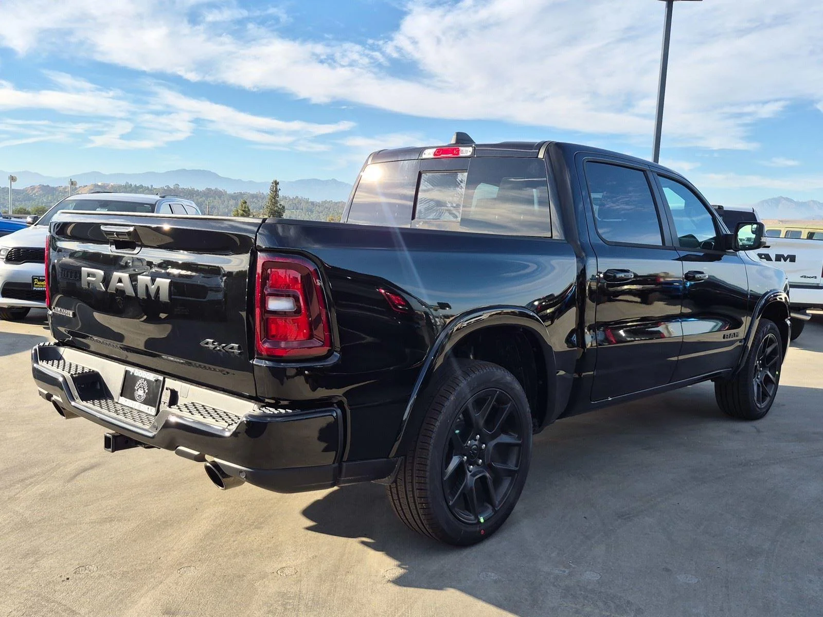 New 2026 Diamond Black Crystal Pearl-Coat Exterior Paint RAM Laramie image 6