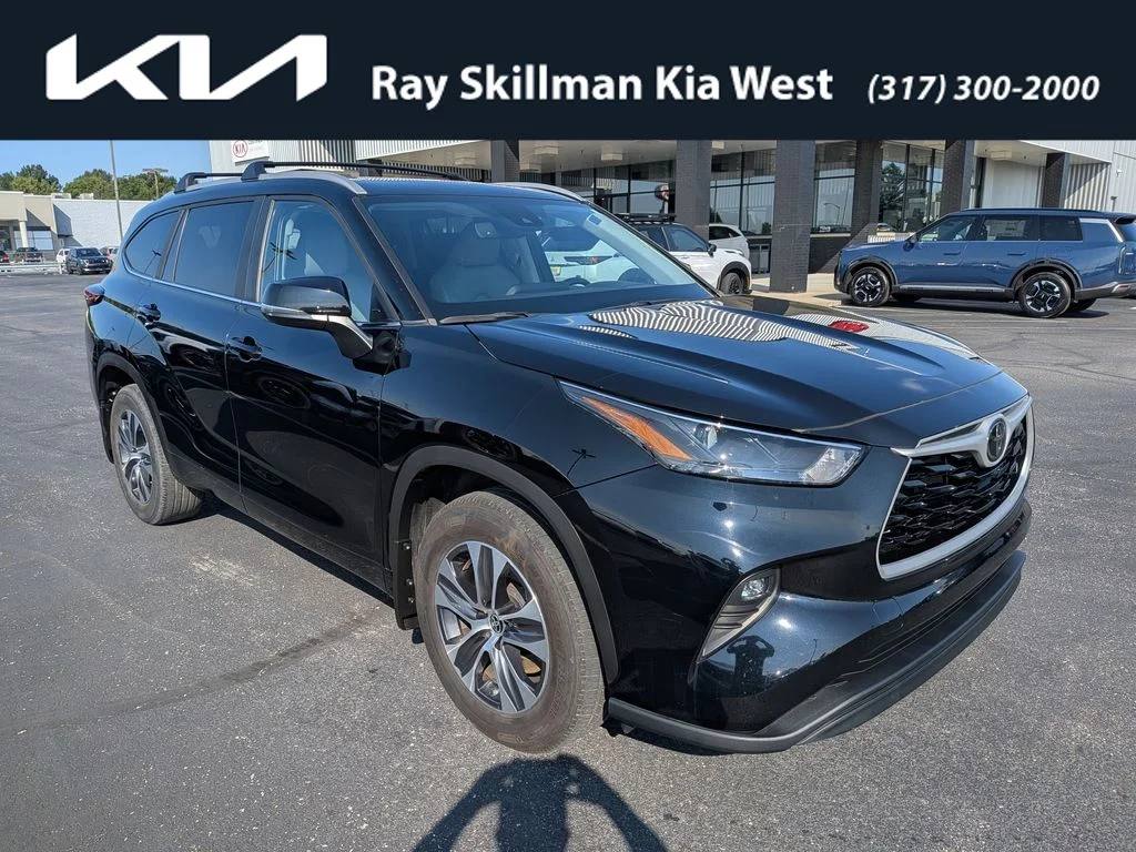 Used 2023 Midnight Black Metallic Toyota XLE image 1