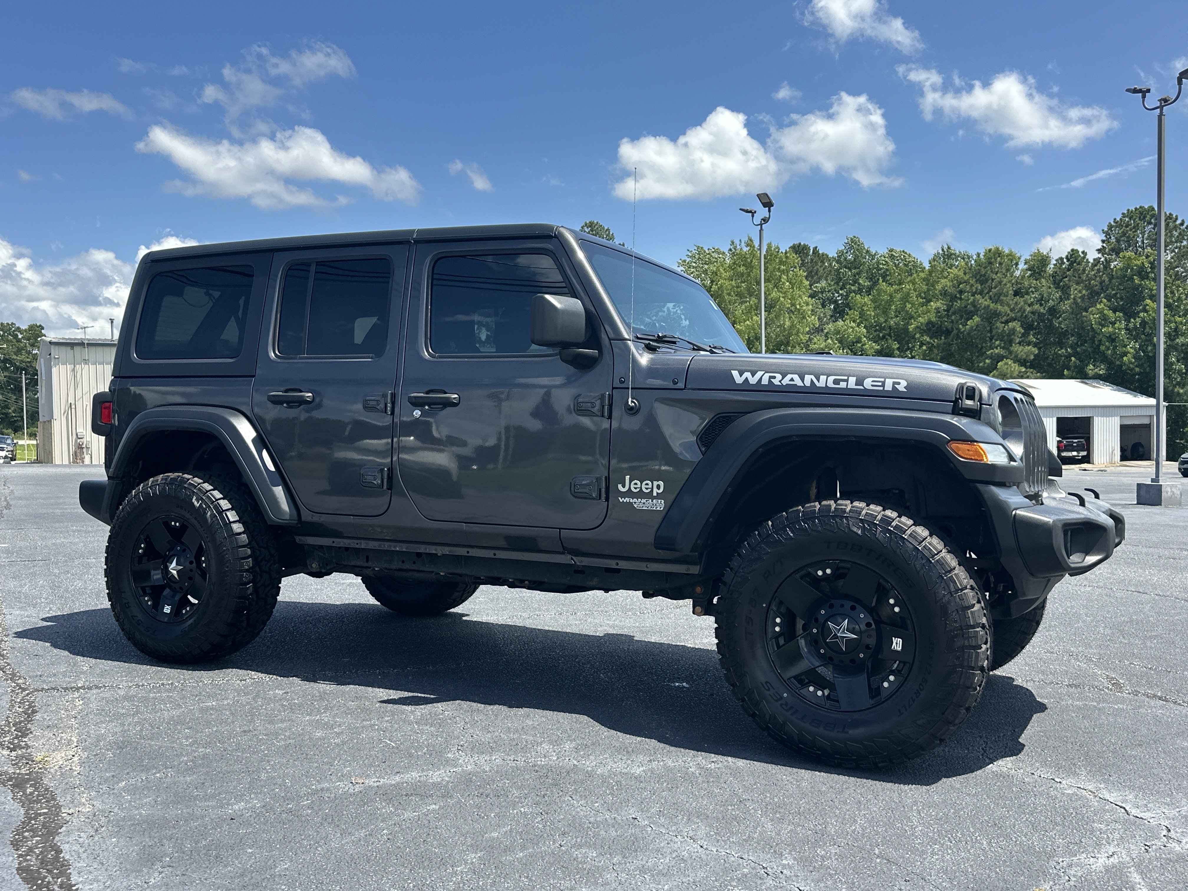 Used 2020 Granite Crystal Metallic Clearcoat Jeep Sport S image 2