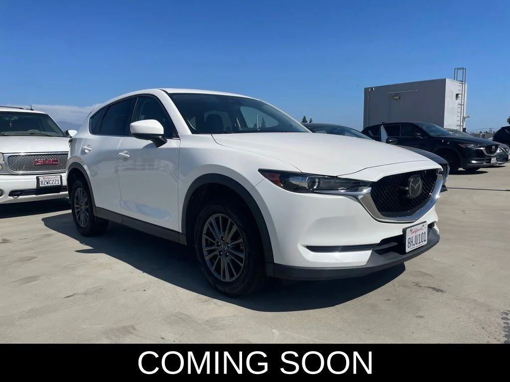 Used 2019 Snowflake White Pearl Mica Mazda Touring image 1