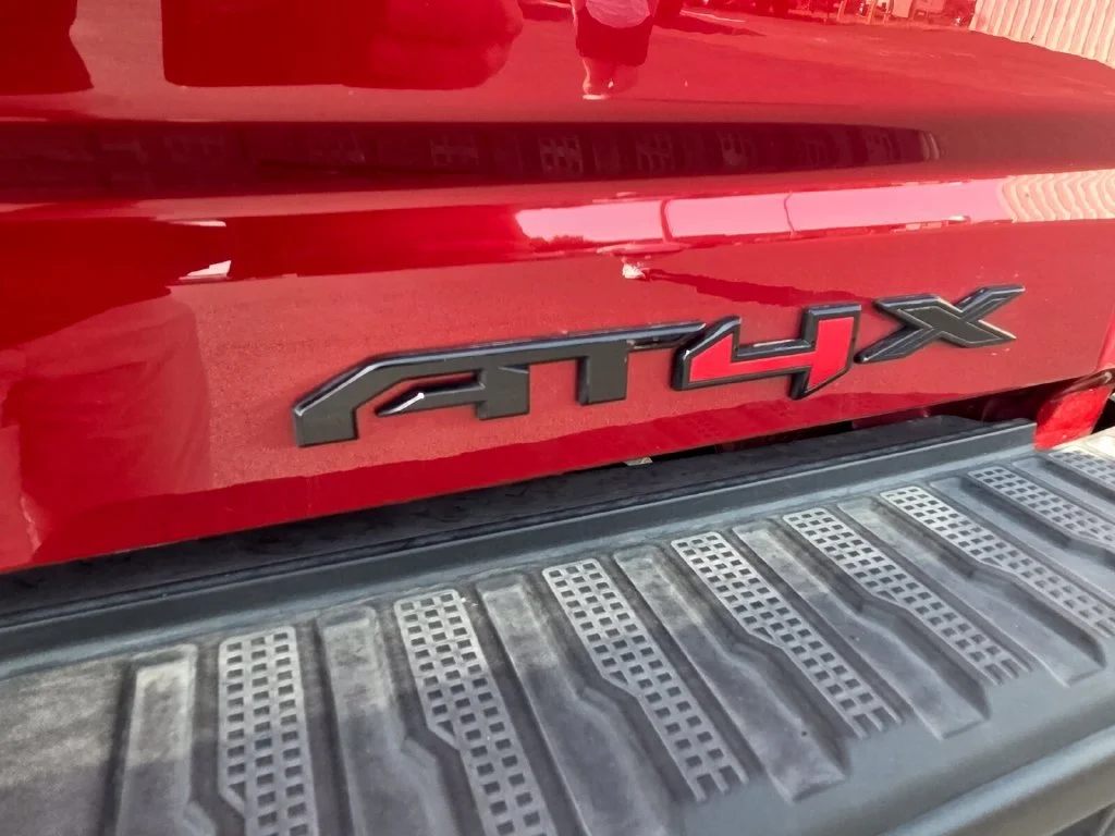 Used 2026 Volcanic Red Tintcoat GMC AT4X image 12