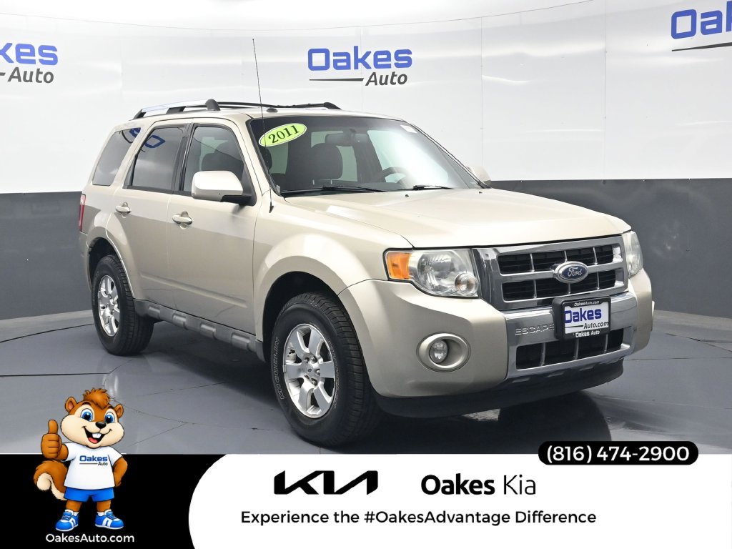 Used 2011 Gold Leaf Metallic Ford Limited image 1