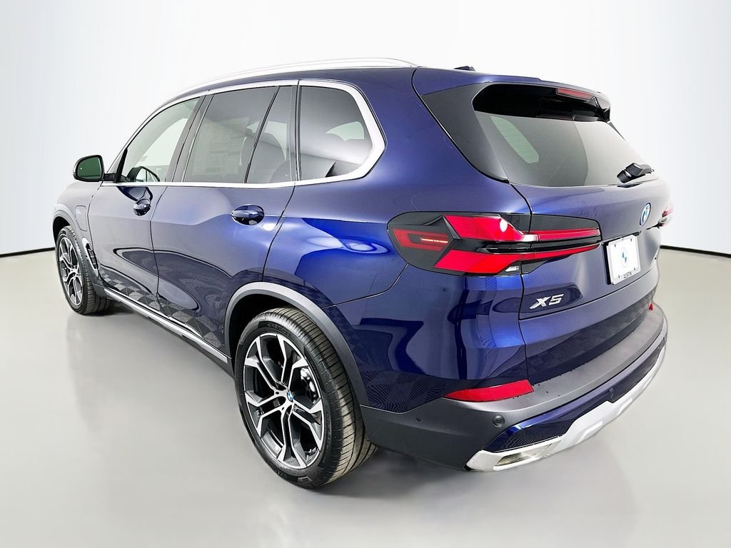 New 2026 Tanzanite Blue II Metallic BMW xDrive50e image 7