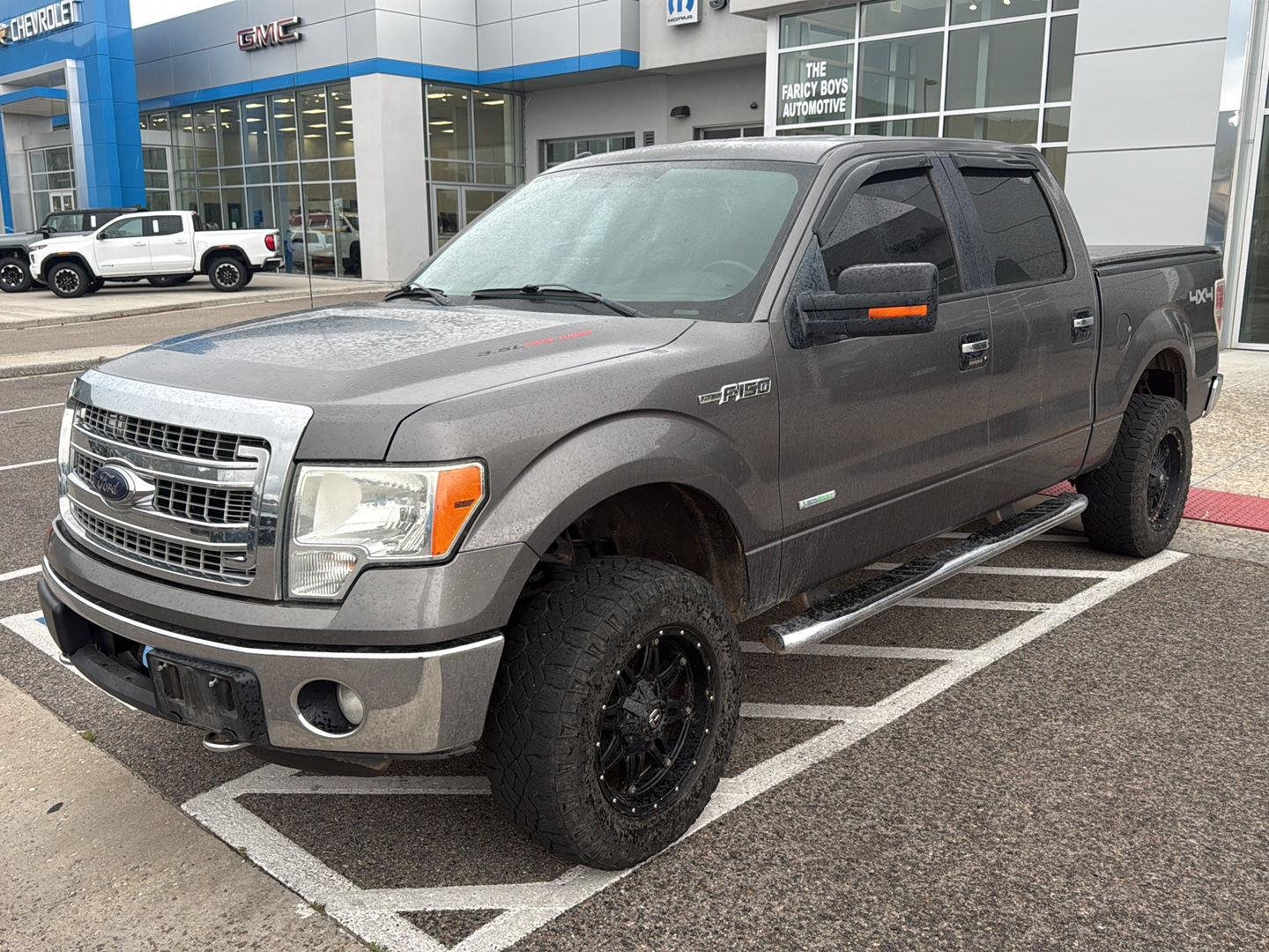 Used 2013 Sterling Gray Metallic Ford XLT image 1