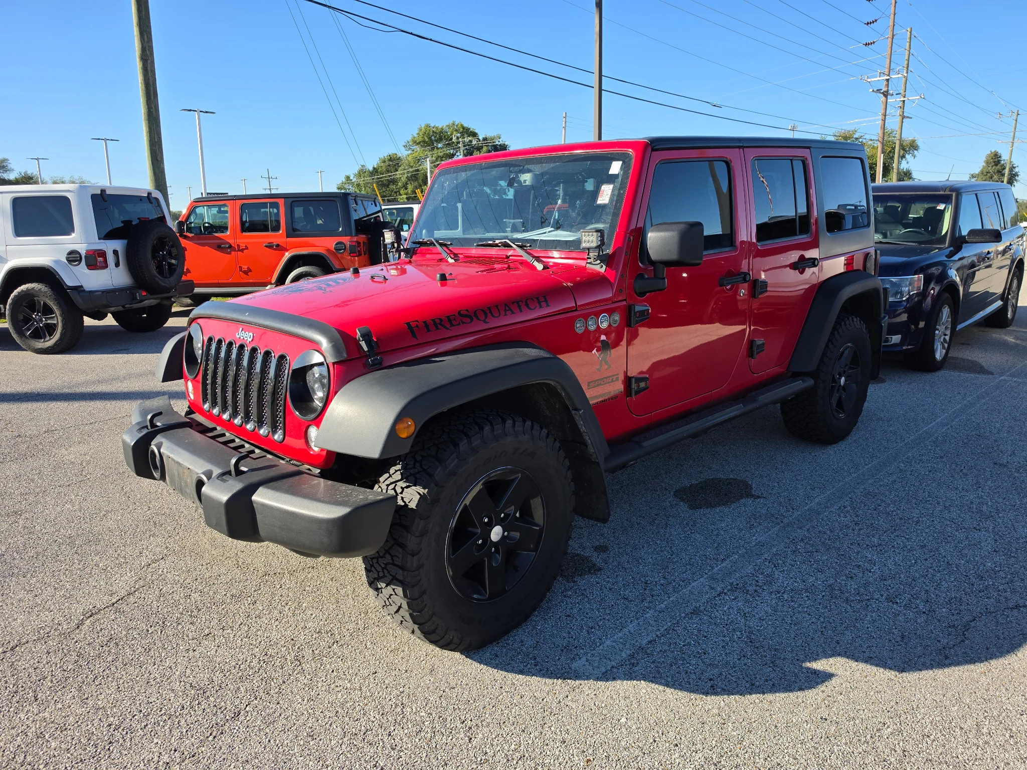 Used 2014 Flame Red Clearcoat Jeep Sport image 1