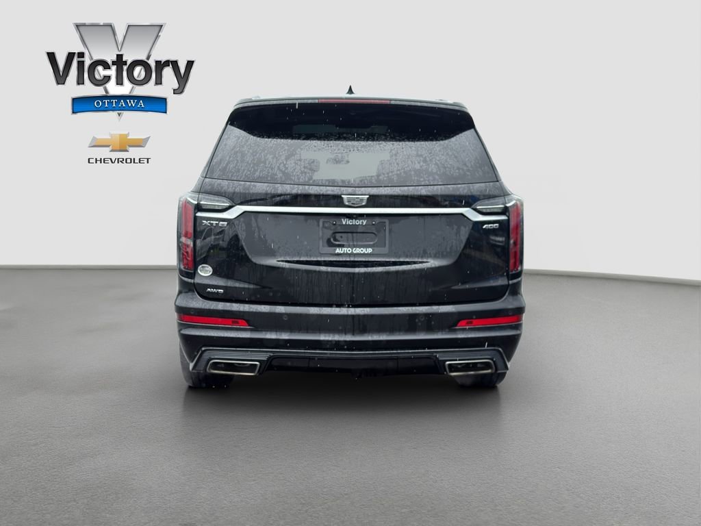 Used 2023 Stellar Black Metallic Cadillac Sport image 5