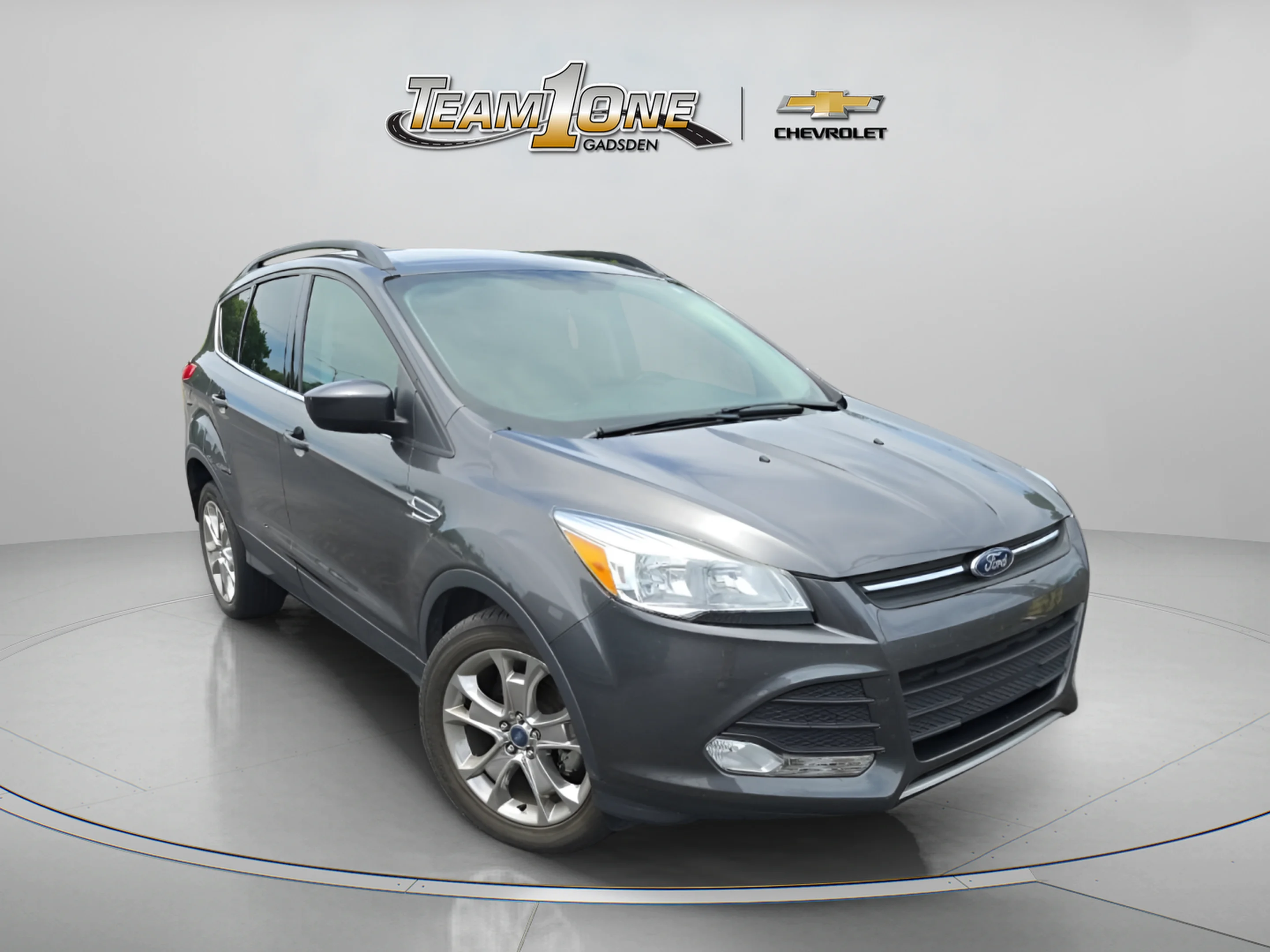 Used 2015 Gray Ford SE image 1