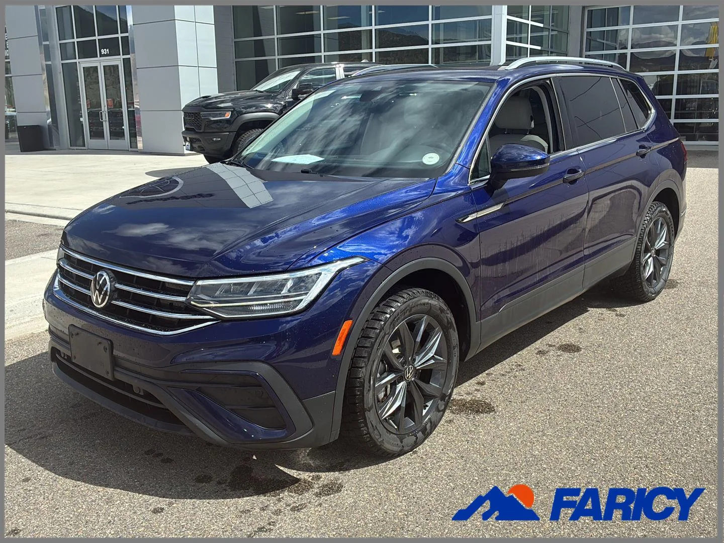 Used 2022 Atlantic Blue Metallic Volkswagen SE image 1