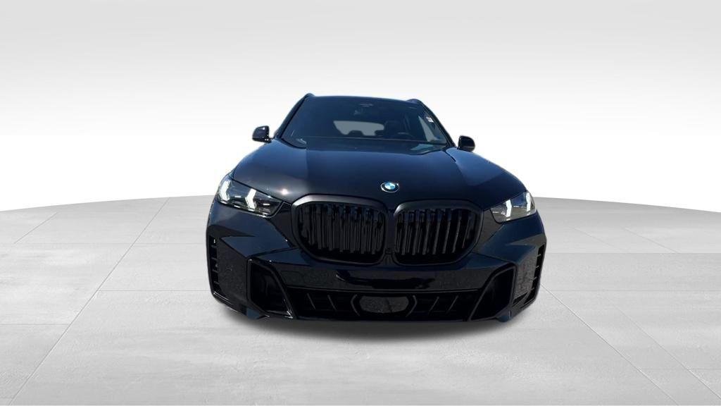 New 2026 Black Sapphire Metallic BMW xDrive40i image 14