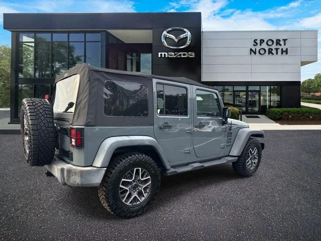 Used 2015 Gray Jeep Unlimited Sport image 3