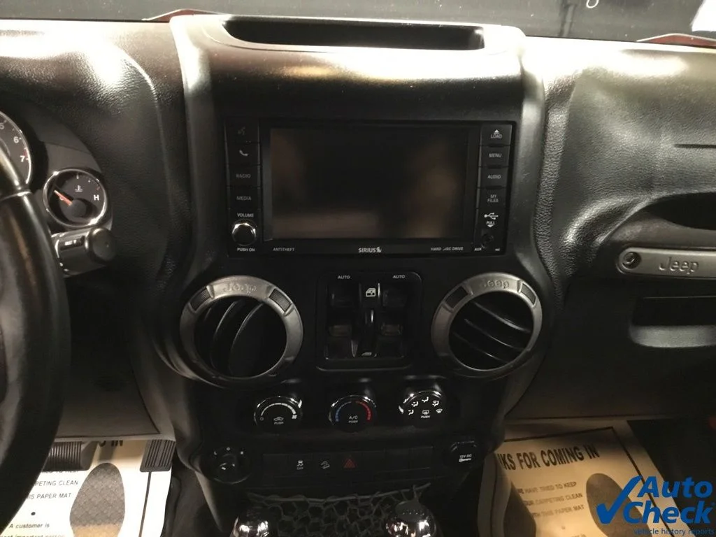 Used 2015 Orange Jeep Unlimited Sport image 50