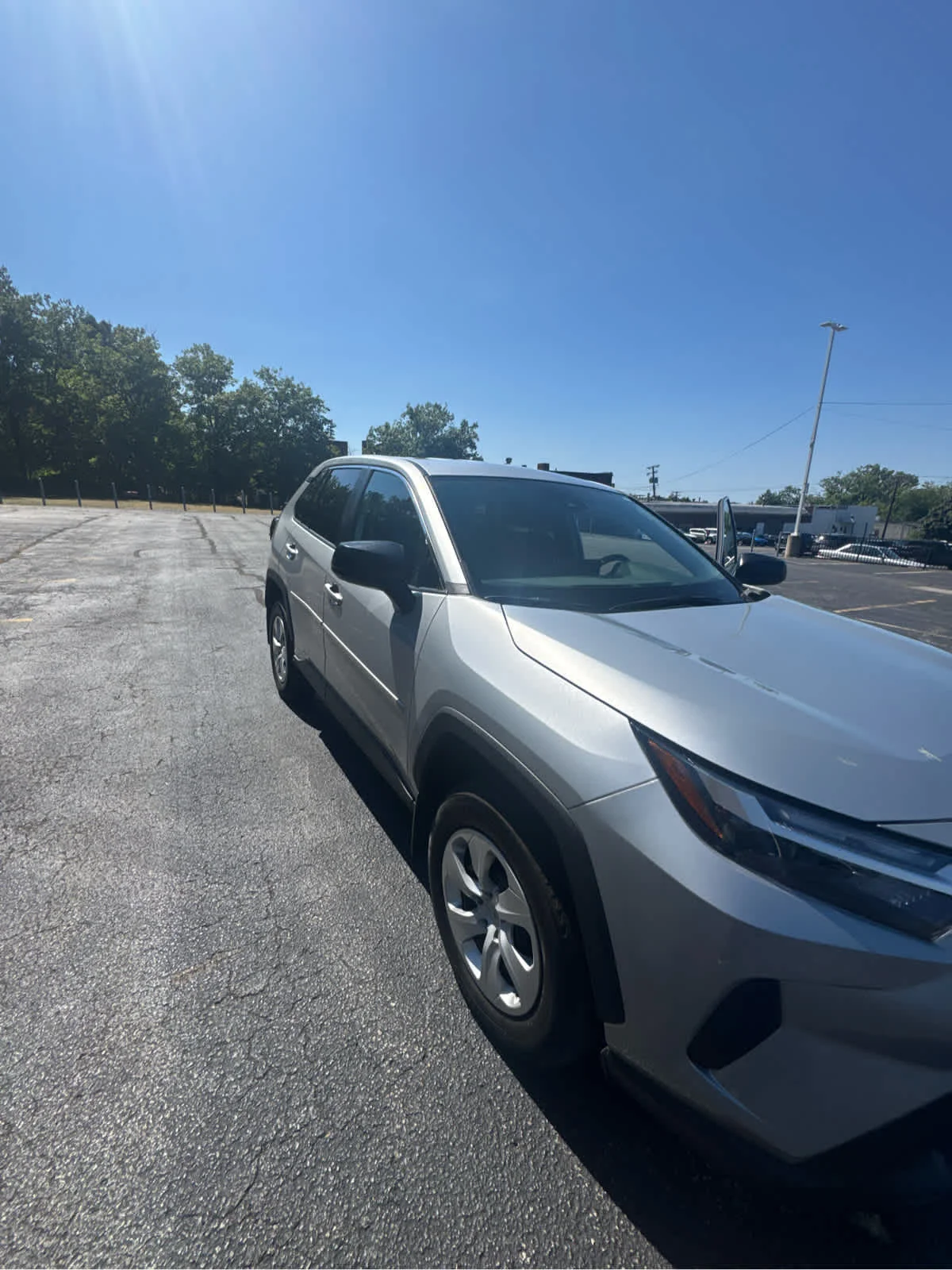 Used 2024 Silver Sky Metallic Toyota LE image 5