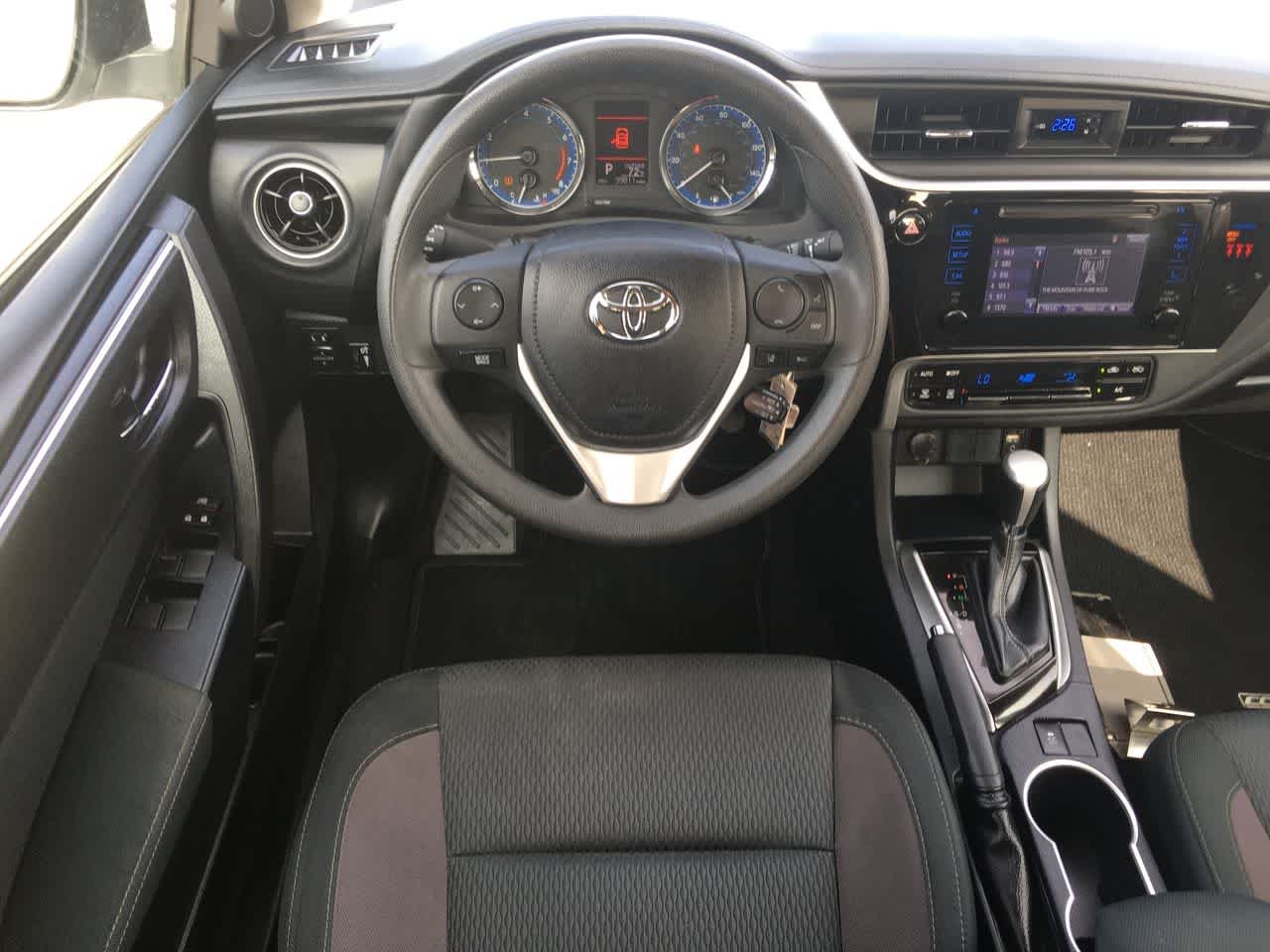 Used 2018 Super White Toyota LE image 17