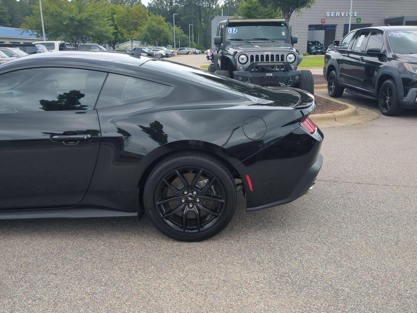 Used 2025 Shadow Black Ford GT Premium image 11