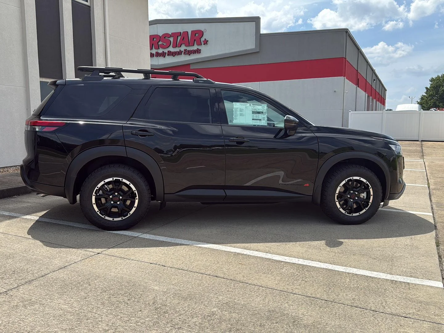 New 2026 Super Black Nissan Rock Creek image 8