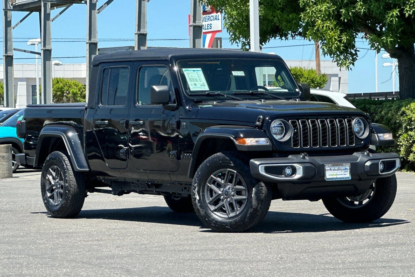 Used 2025 Black Clearcoat Jeep Sport S image 1