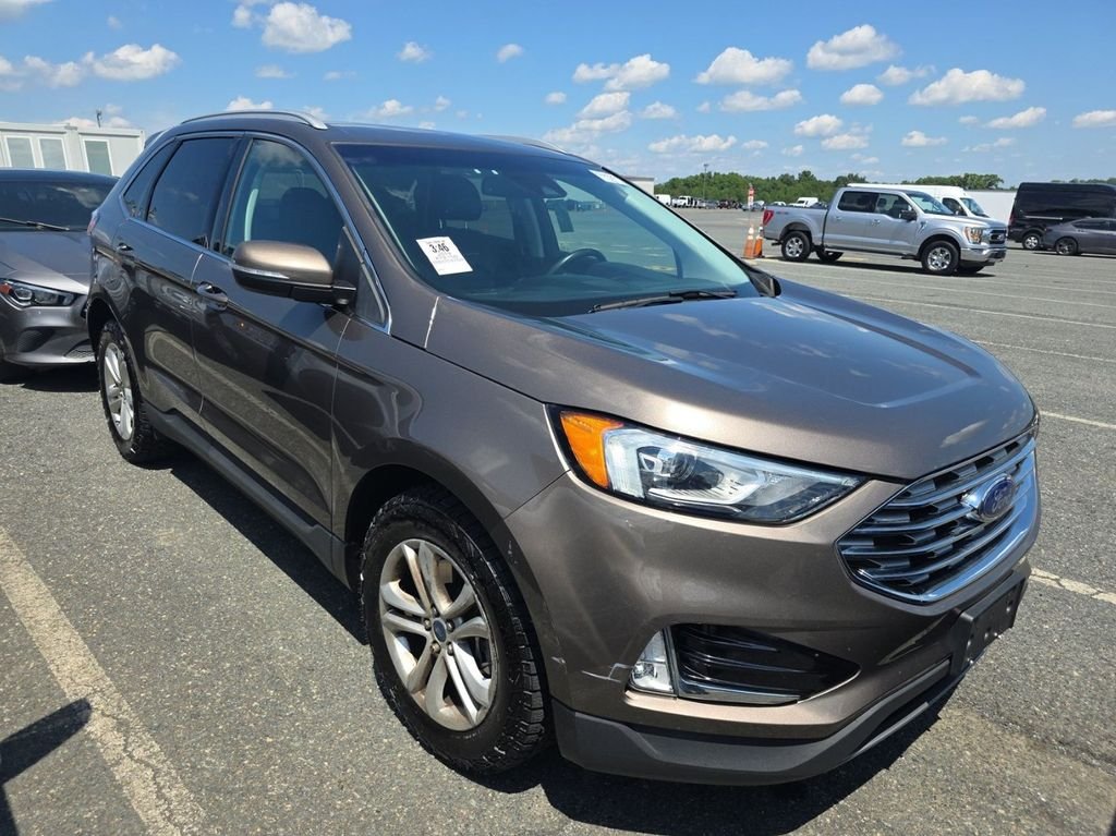 Used 2019 Stone Gray Metallic Ford SEL image 4